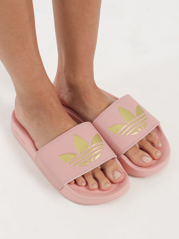 Womens Adilette Lite Slides in Wonder Mauve Matte Gold Glue