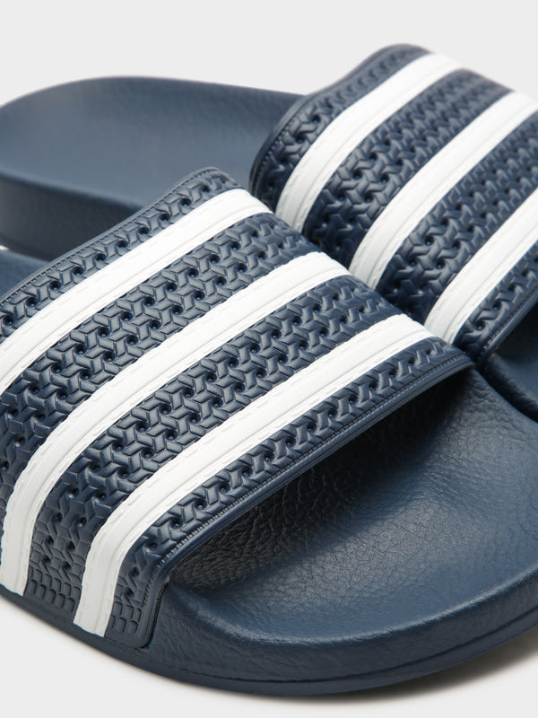 Adidas originals adilette sliders in clearance white navy