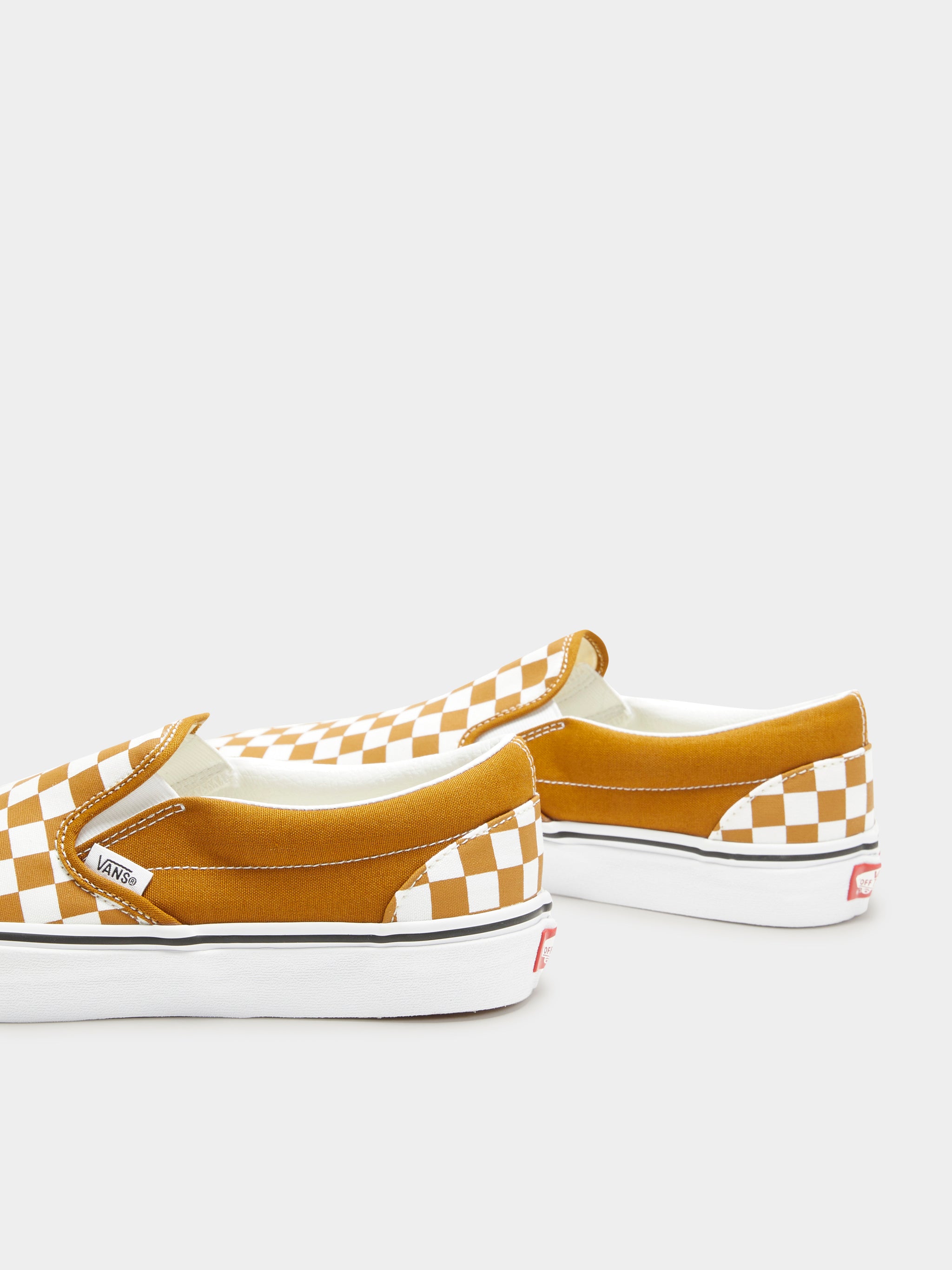 Orange and white slip hotsell on vans