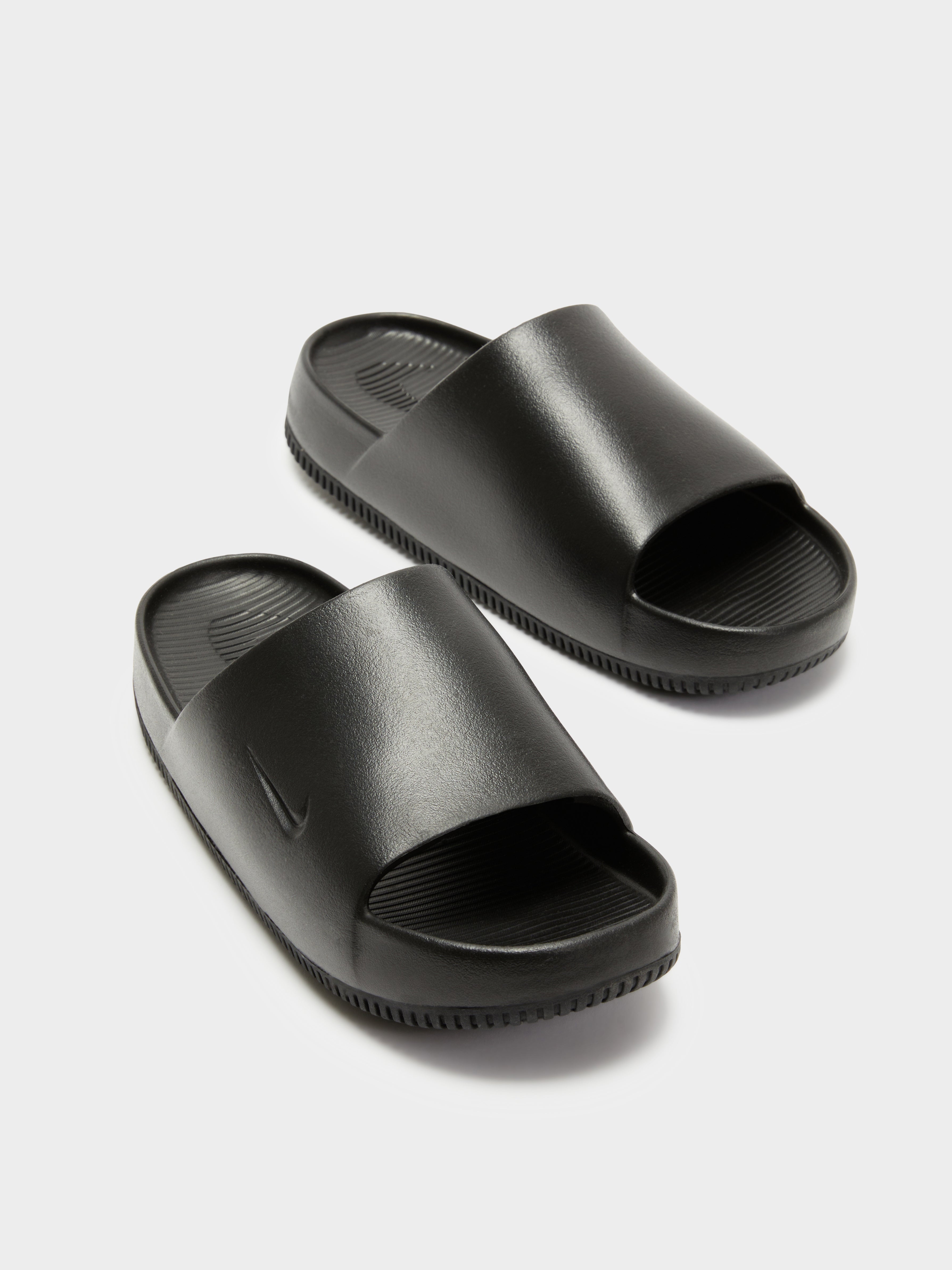 Plain black sales nike slides