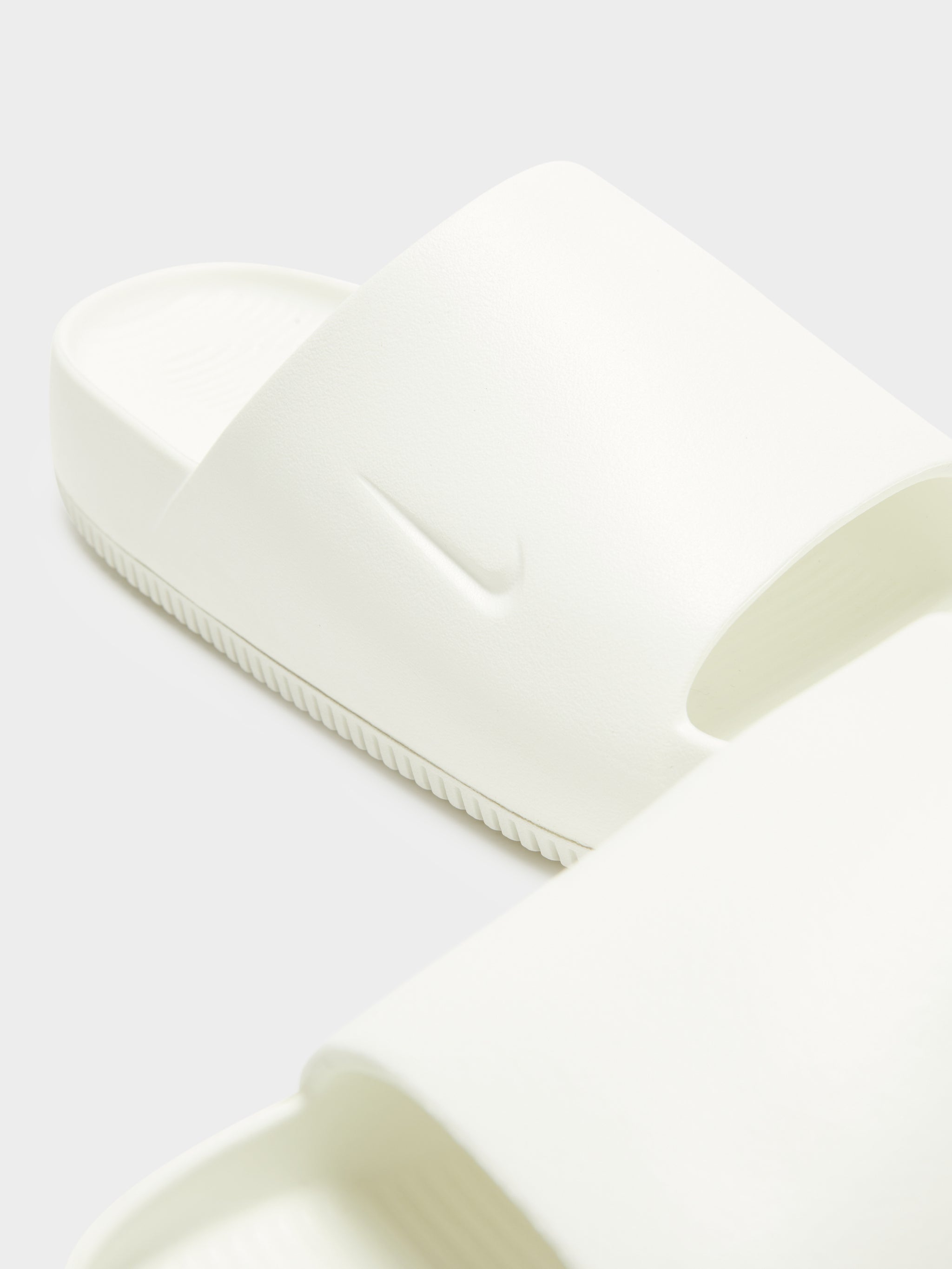 Womens white best sale nike sliders