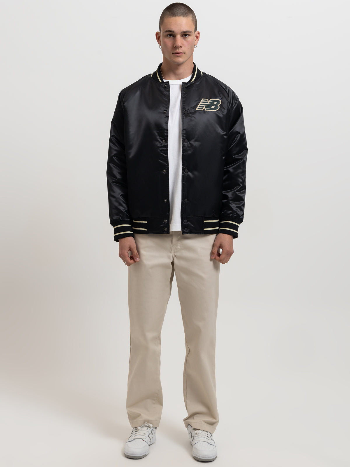 New Balance Athletics Varsity Satin Bomber Jacket in Black | Black