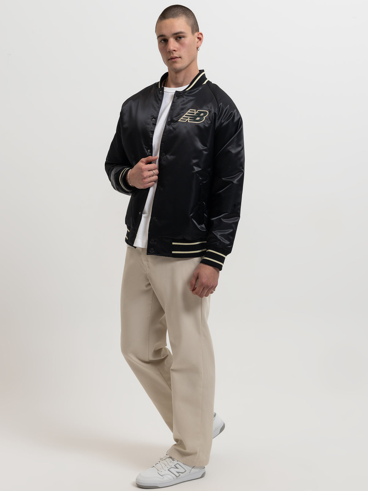 New Balance Athletics Varsity Satin Bomber Jacket in Black | Black