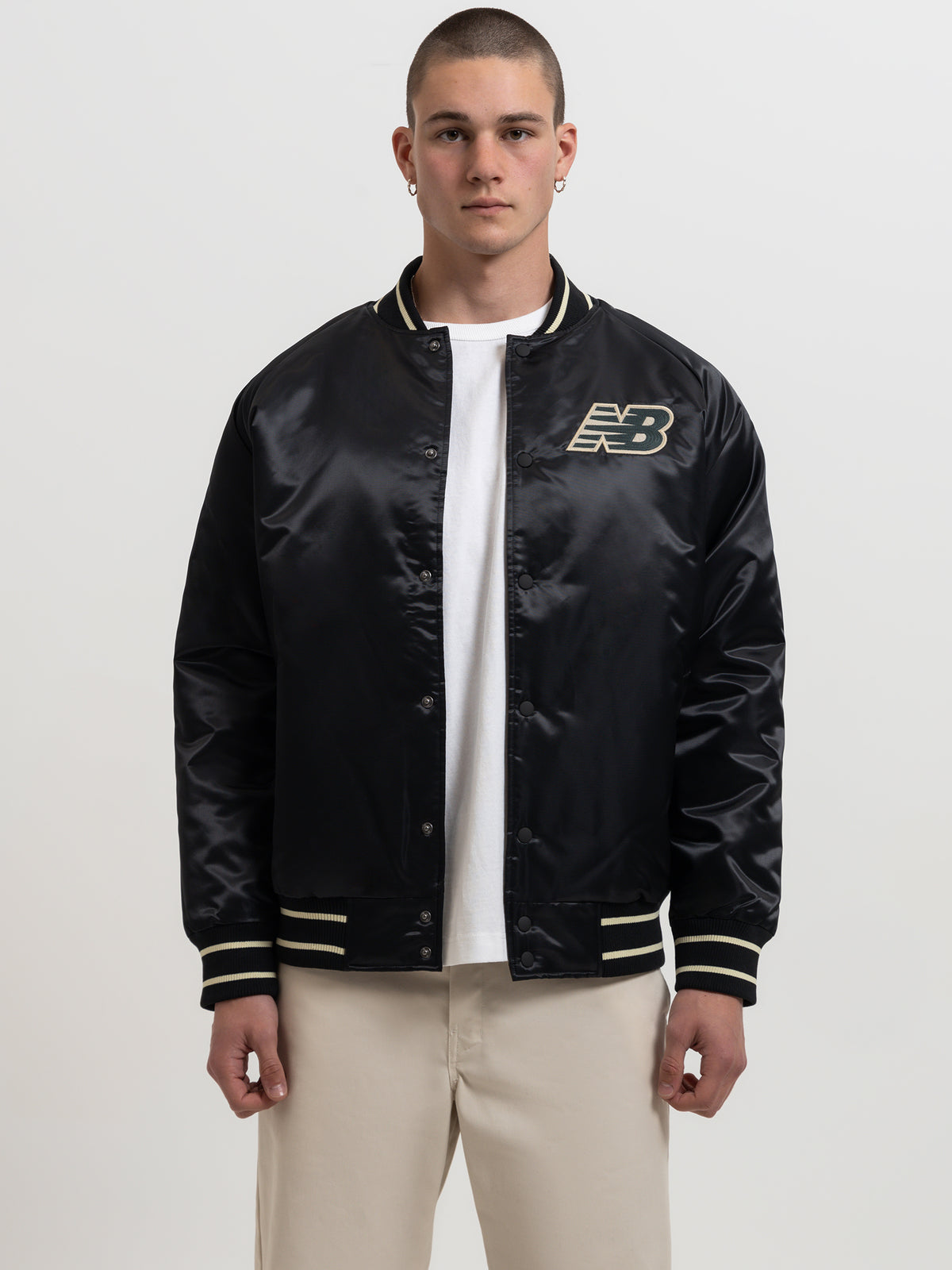 New Balance Athletics Varsity Satin Bomber Jacket in Black | Black