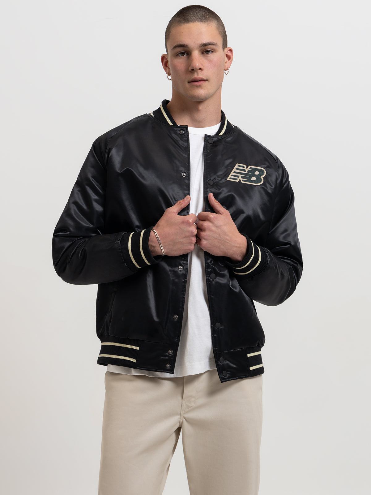 New Balance Athletics Varsity Satin Bomber Jacket in Black | Black