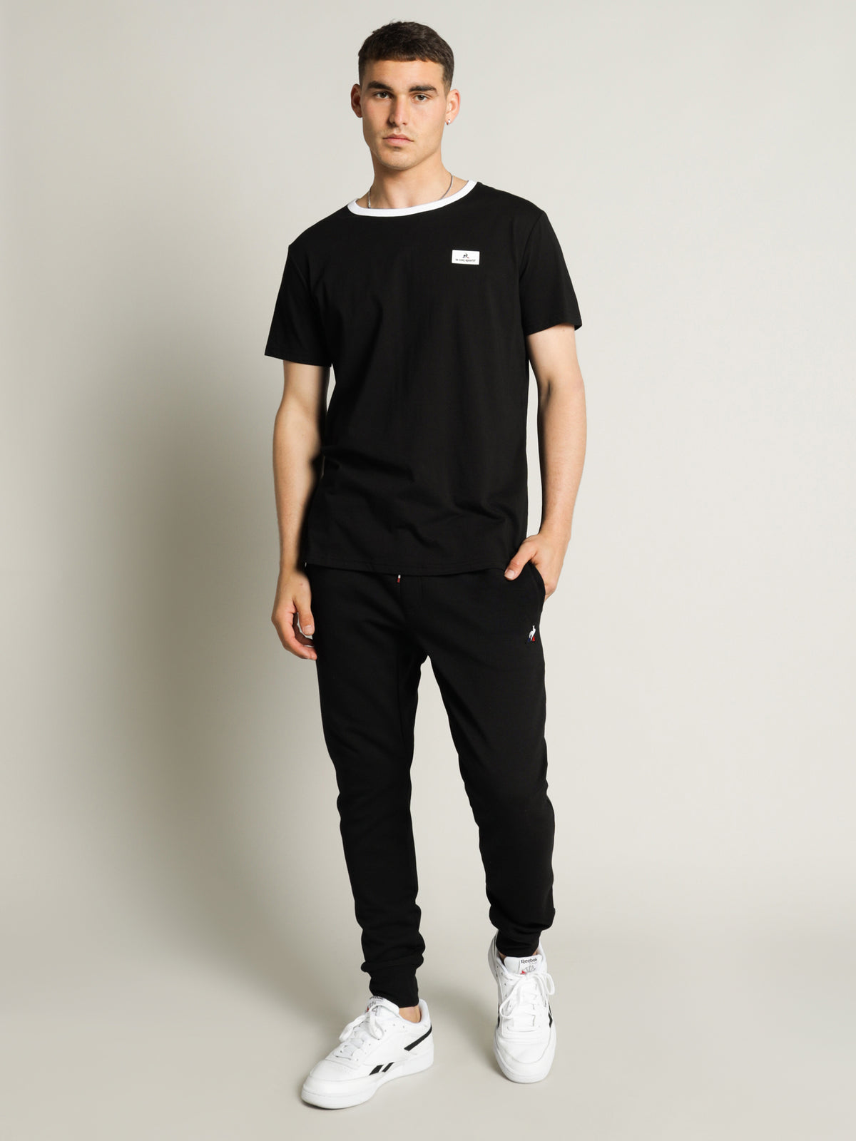 Le Coq Sportif Essential Track Pants in Black | Black