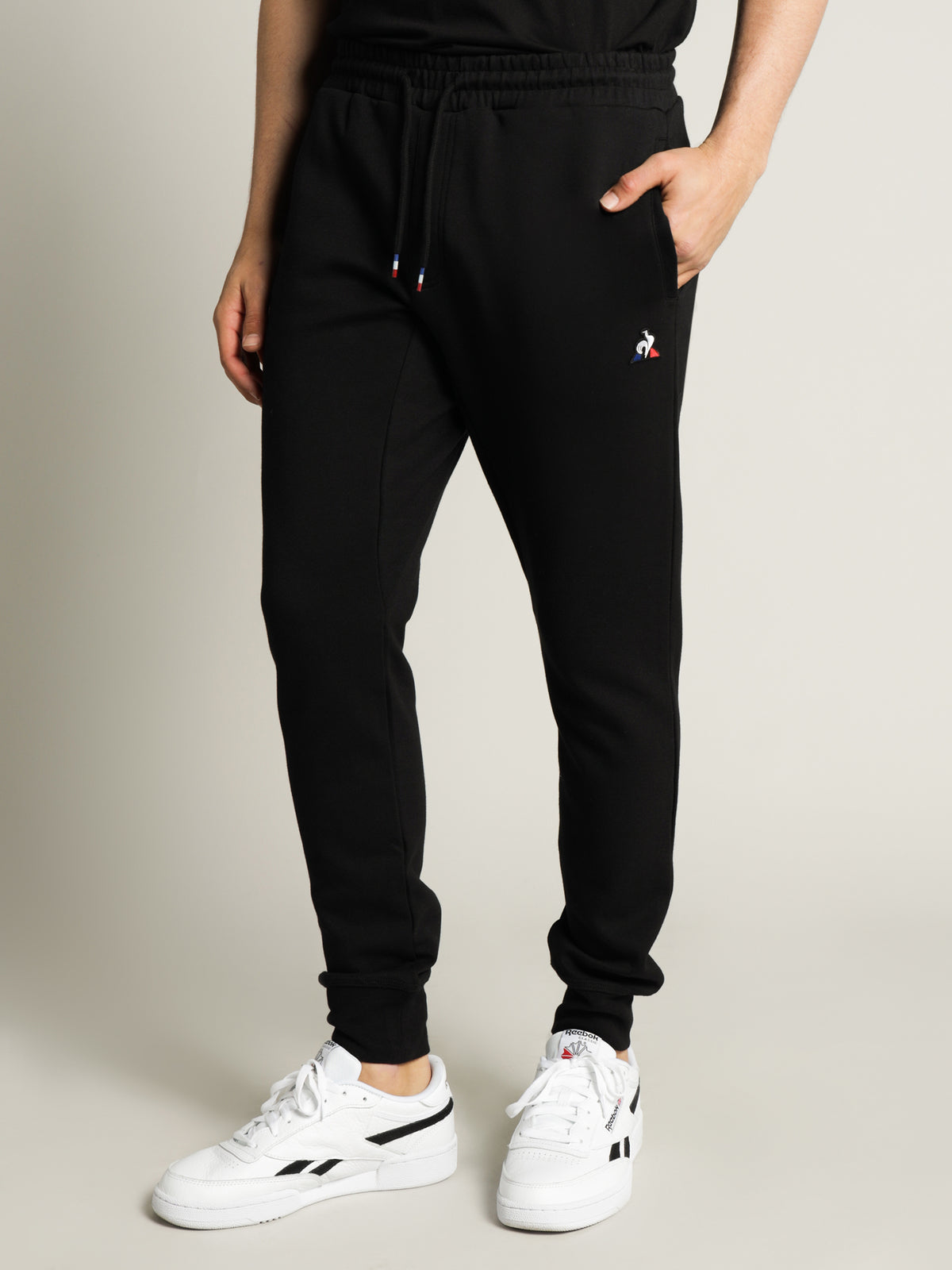 Le Coq Sportif Essential Track Pants in Black | Black