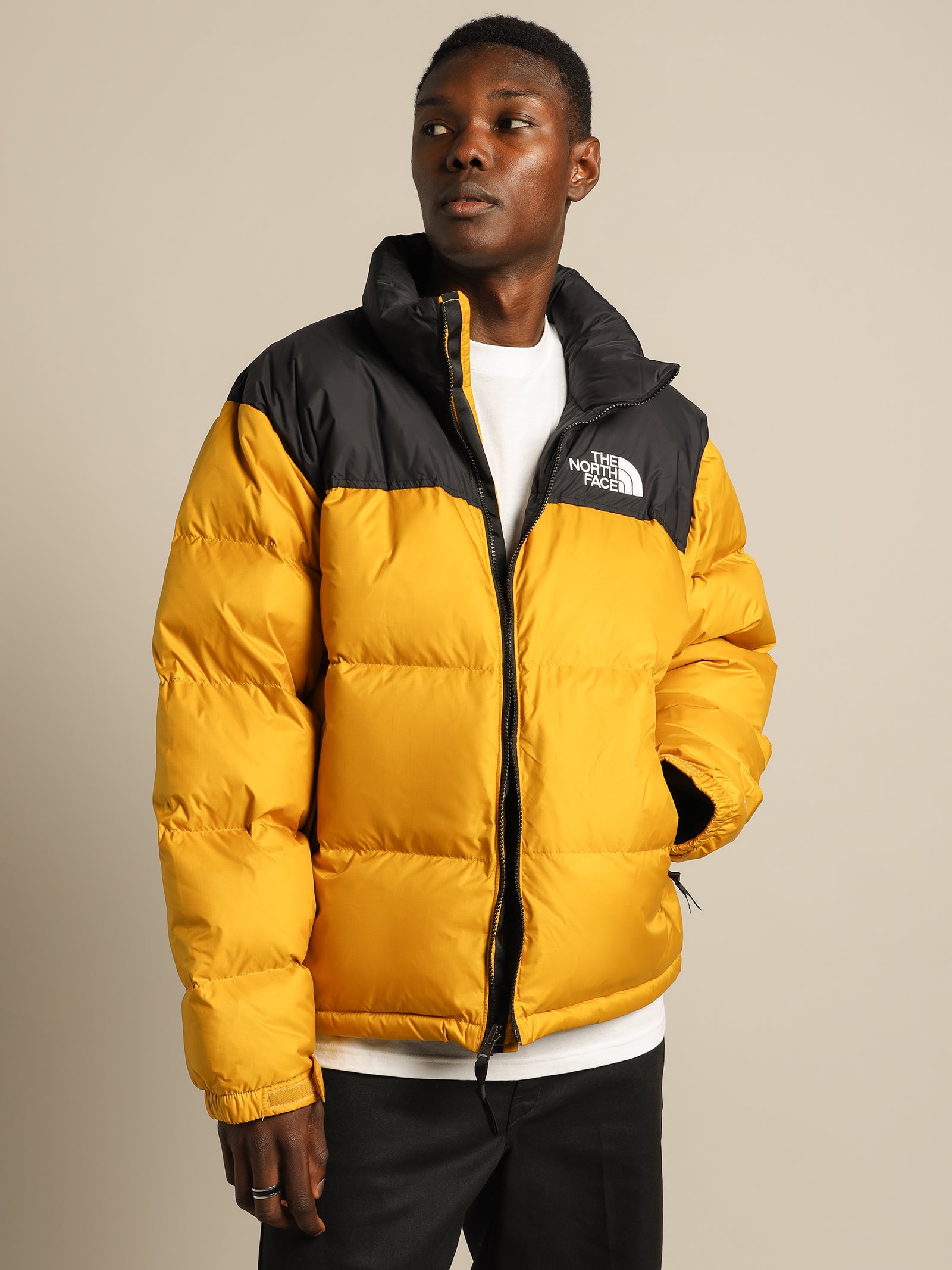 Yellow nuptse store north face