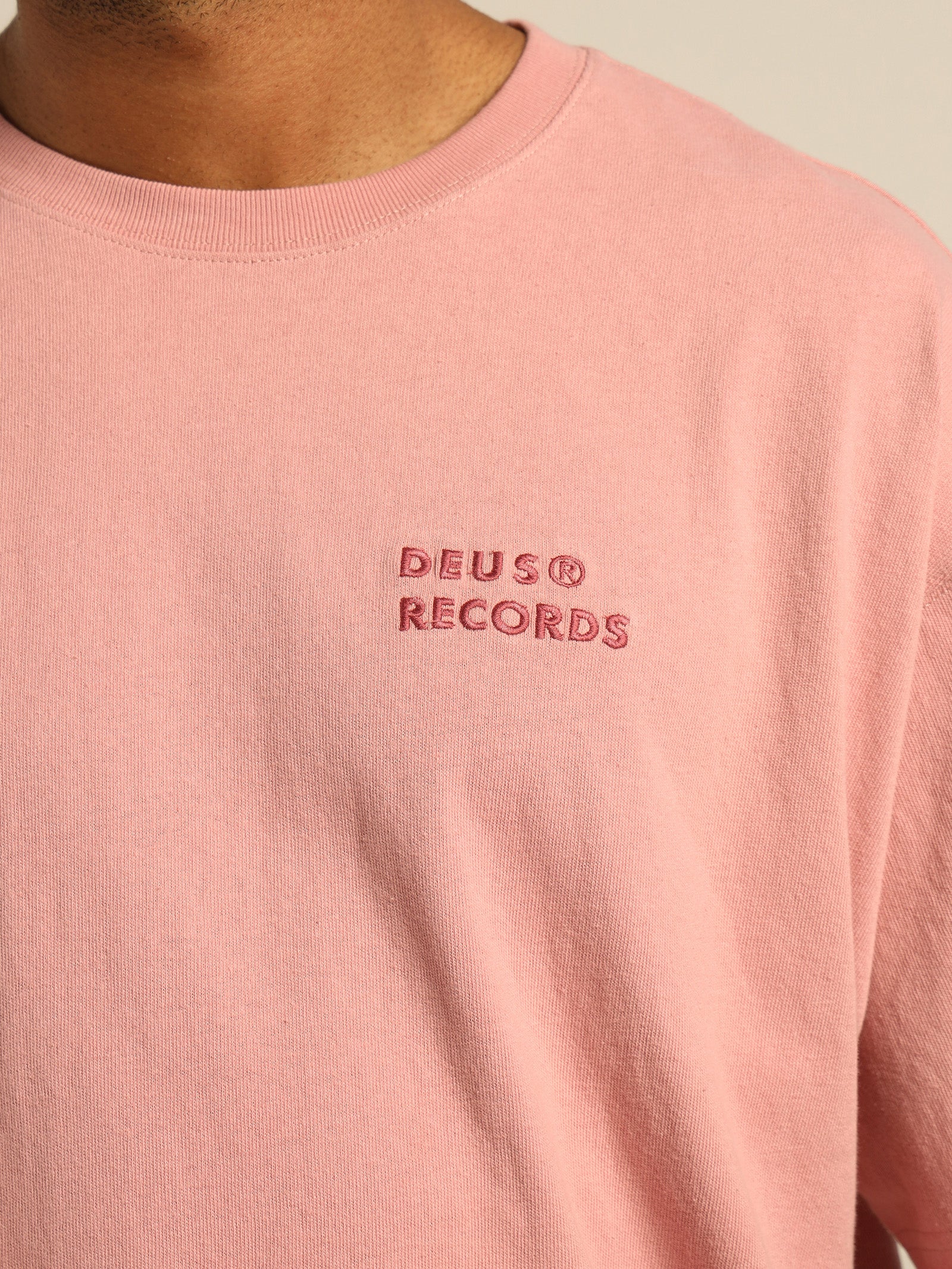 Deus Records All Caps T-Shirt in Zephyr Pink