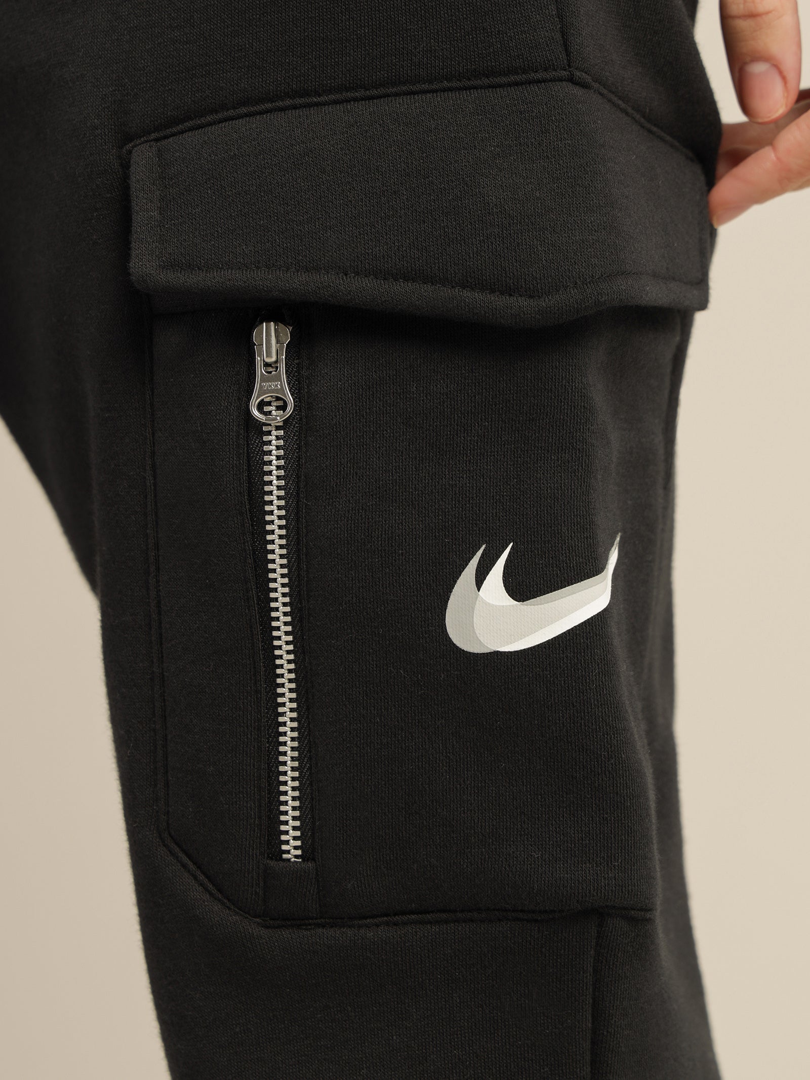 Nike graphic outline swoosh 2025 cuffed cargo joggers in black