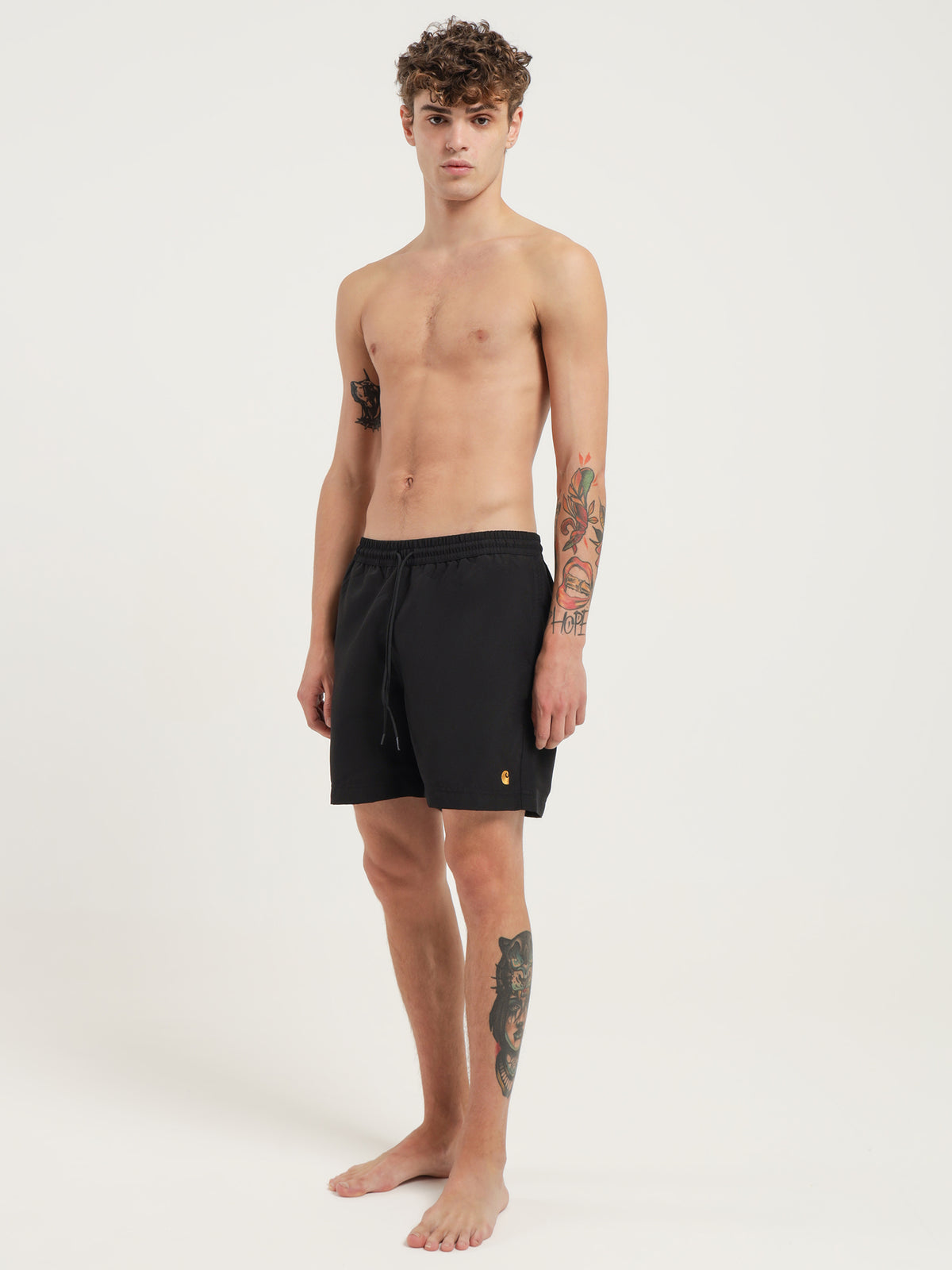 Carhartt Wip Chase Swim Trunks in Black & Gold | Black/Gold