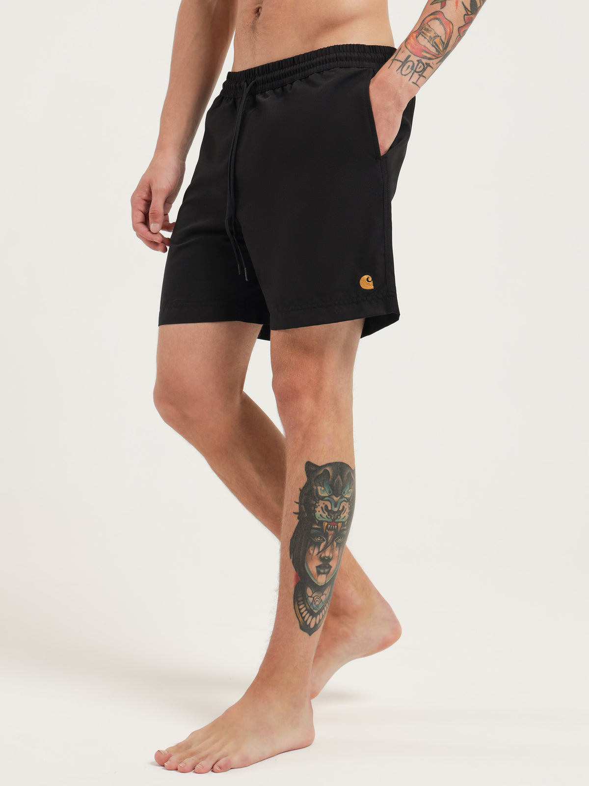 Carhartt wip Chase Swim Trunks in Black Gold Black gold Glue Store