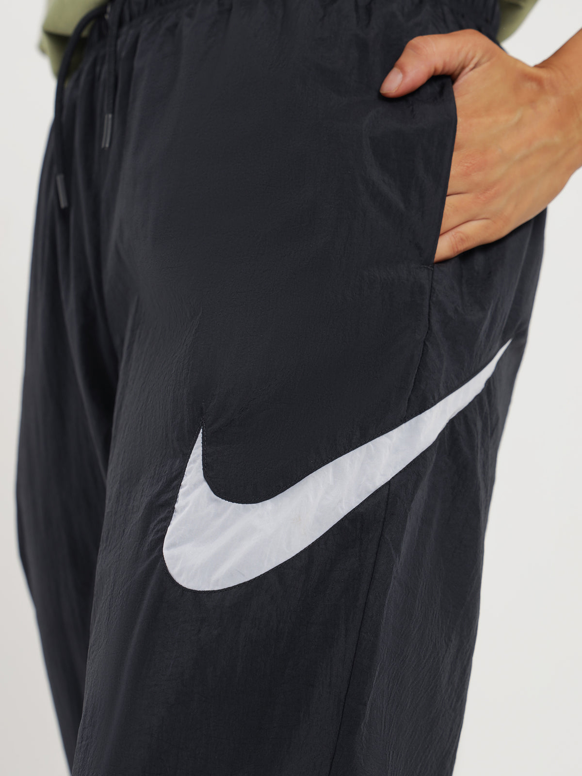 Nike Sportswear Essentials Mid-Rise Track Pants in Black & White | Black/White