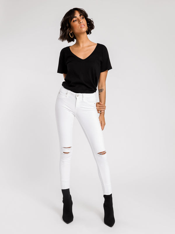 å Lisa Slit Knee Cropped Jeans in Optic White Denim White | Glue Store