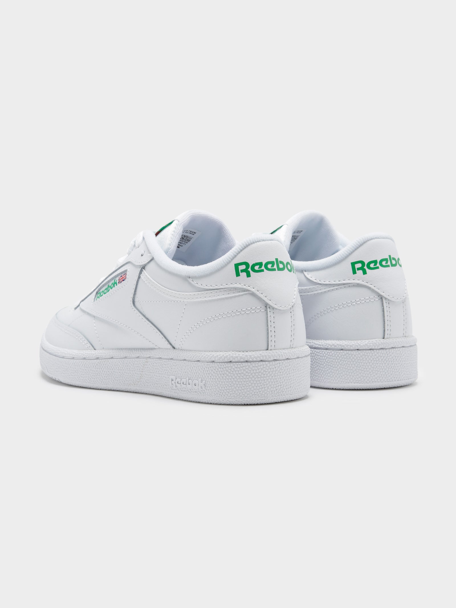 Green and white on sale reebok