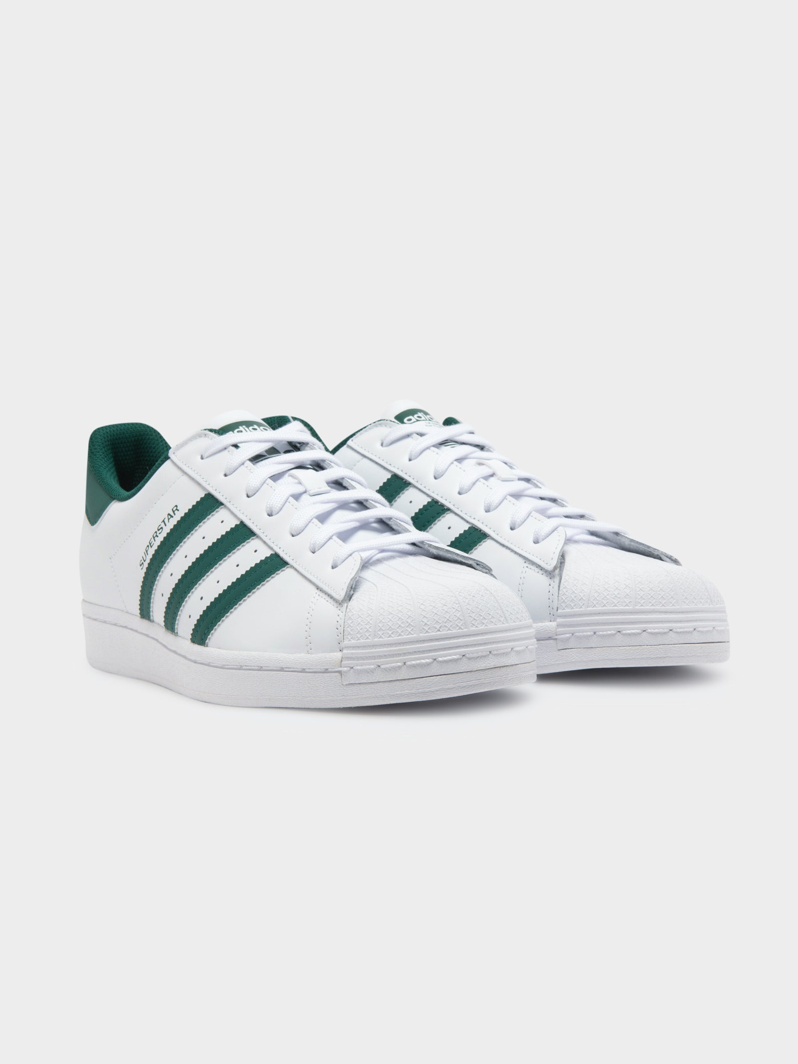 Green and white on sale shell toe adidas