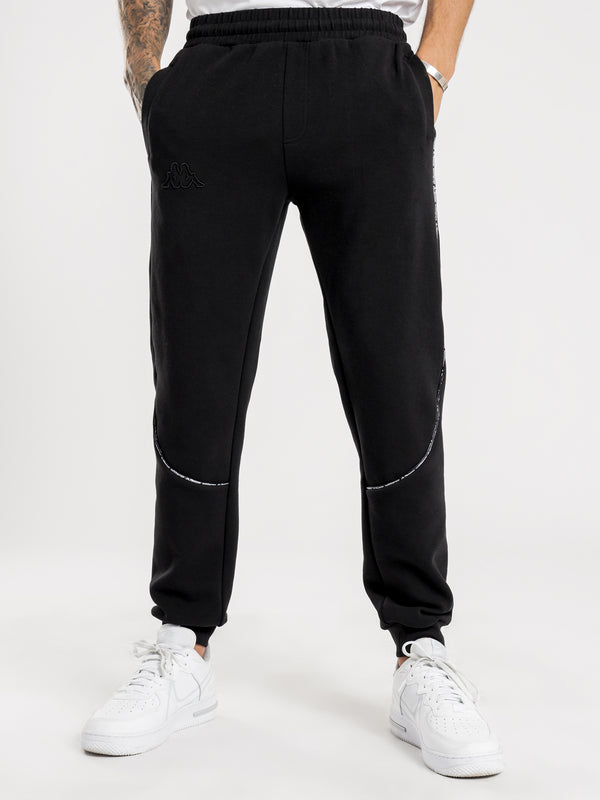 Kappa Logo Tape Bapa Track Pants in Black 005 black | Glue Store