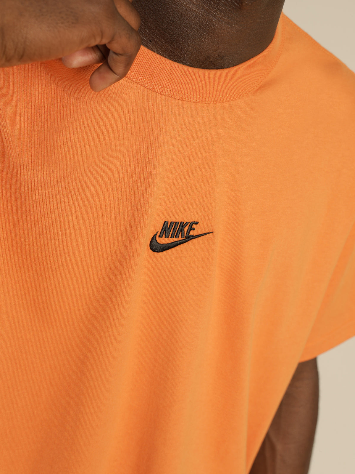 Nike Sportswear Premium Essentials T-Shirt in Hot Curry Orange | Orange