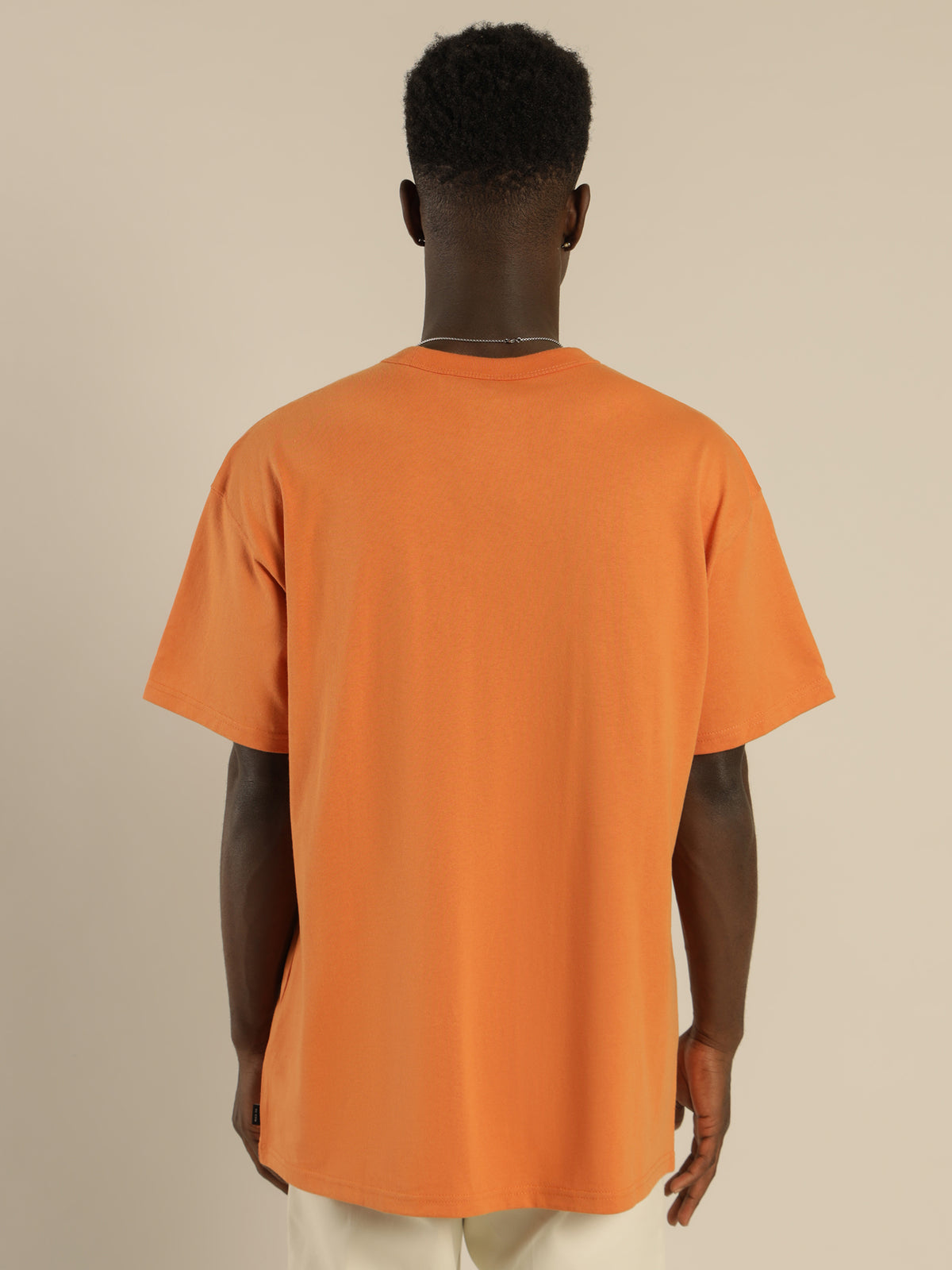 Nike Sportswear Premium Essentials T-Shirt in Hot Curry Orange | Orange