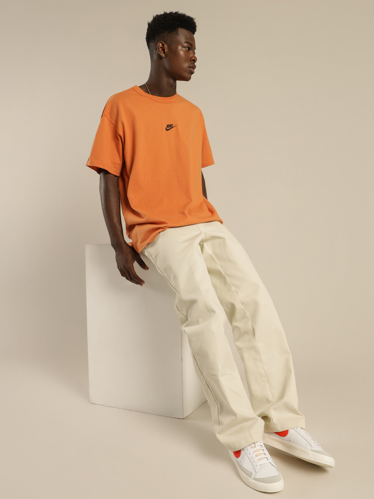 Nike Sportswear Premium Essentials T-Shirt in Hot Curry Orange | Orange