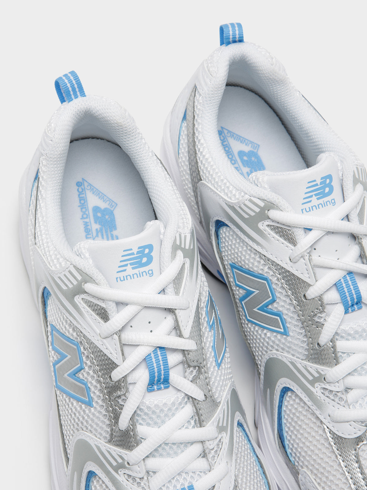 New Balance Unisex 530 Sneakers in White & Blue | White/Blue