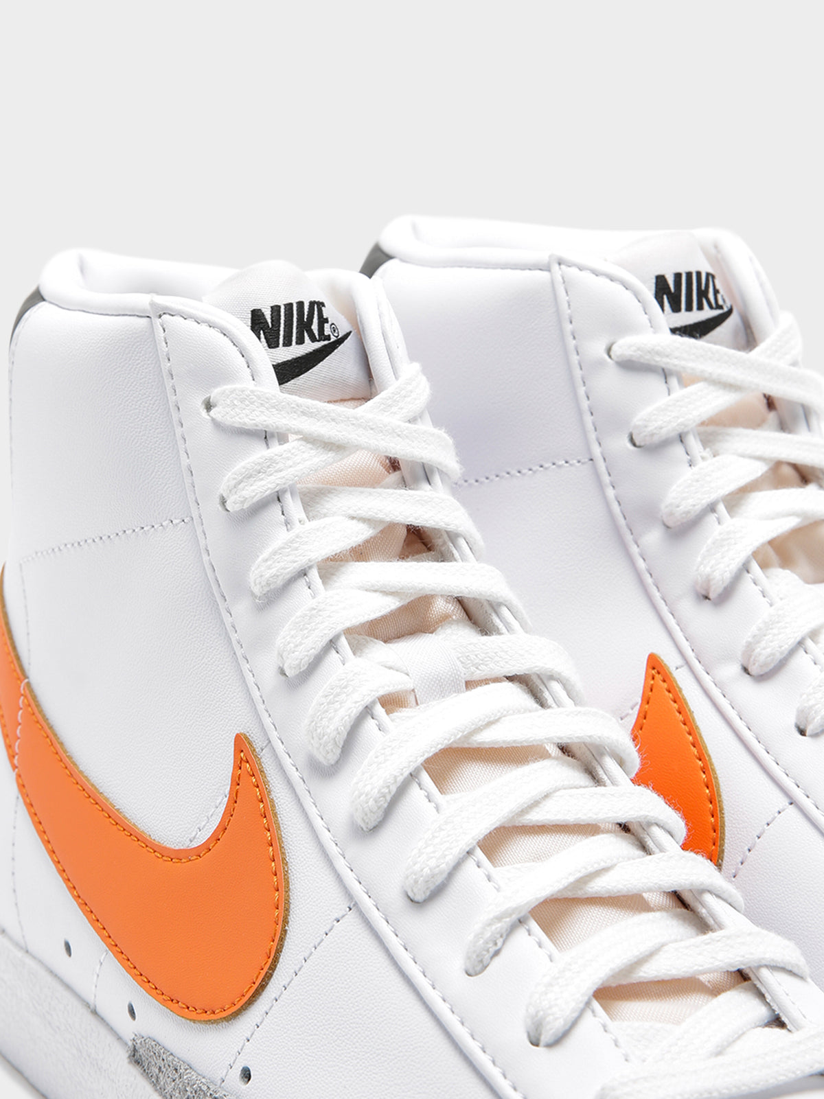 Nike Mens Blazer Mid 77' Sneakers in White & Orange | White/Orange