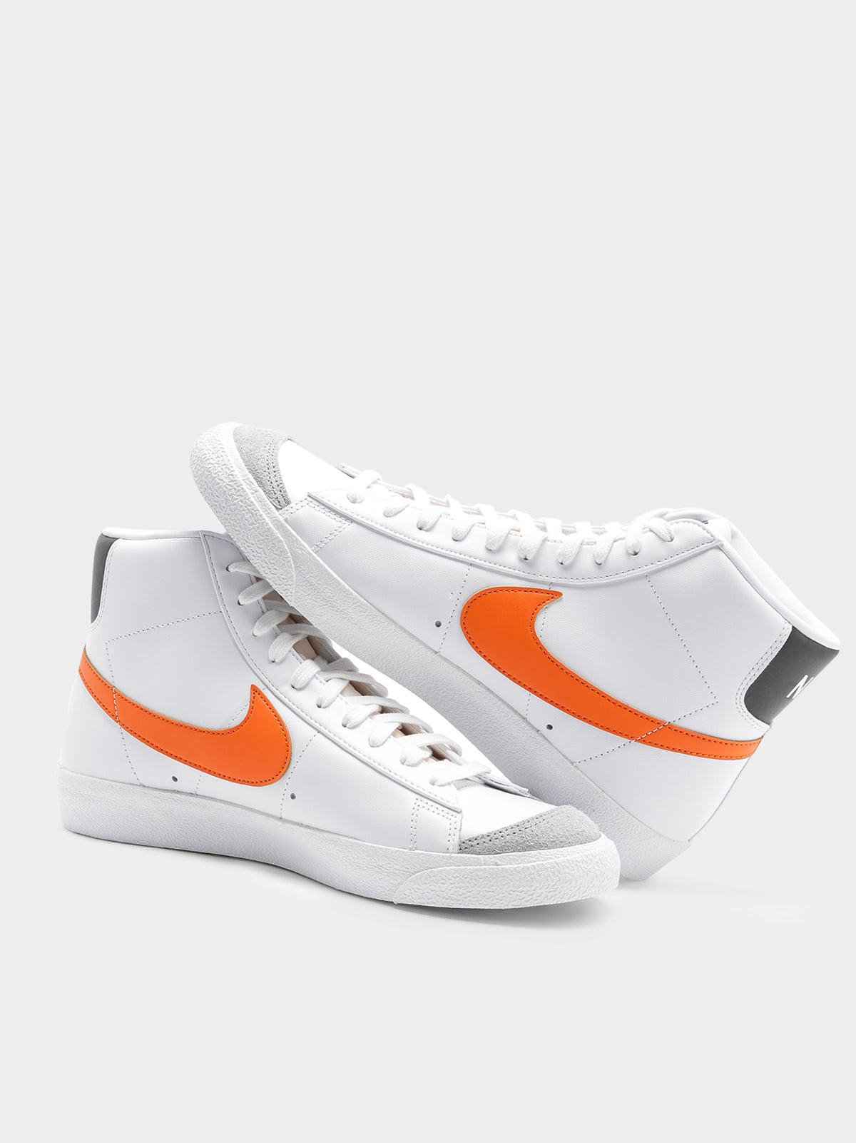 Nike Mens Blazer Mid 77' Sneakers in White & Orange | White/Orange