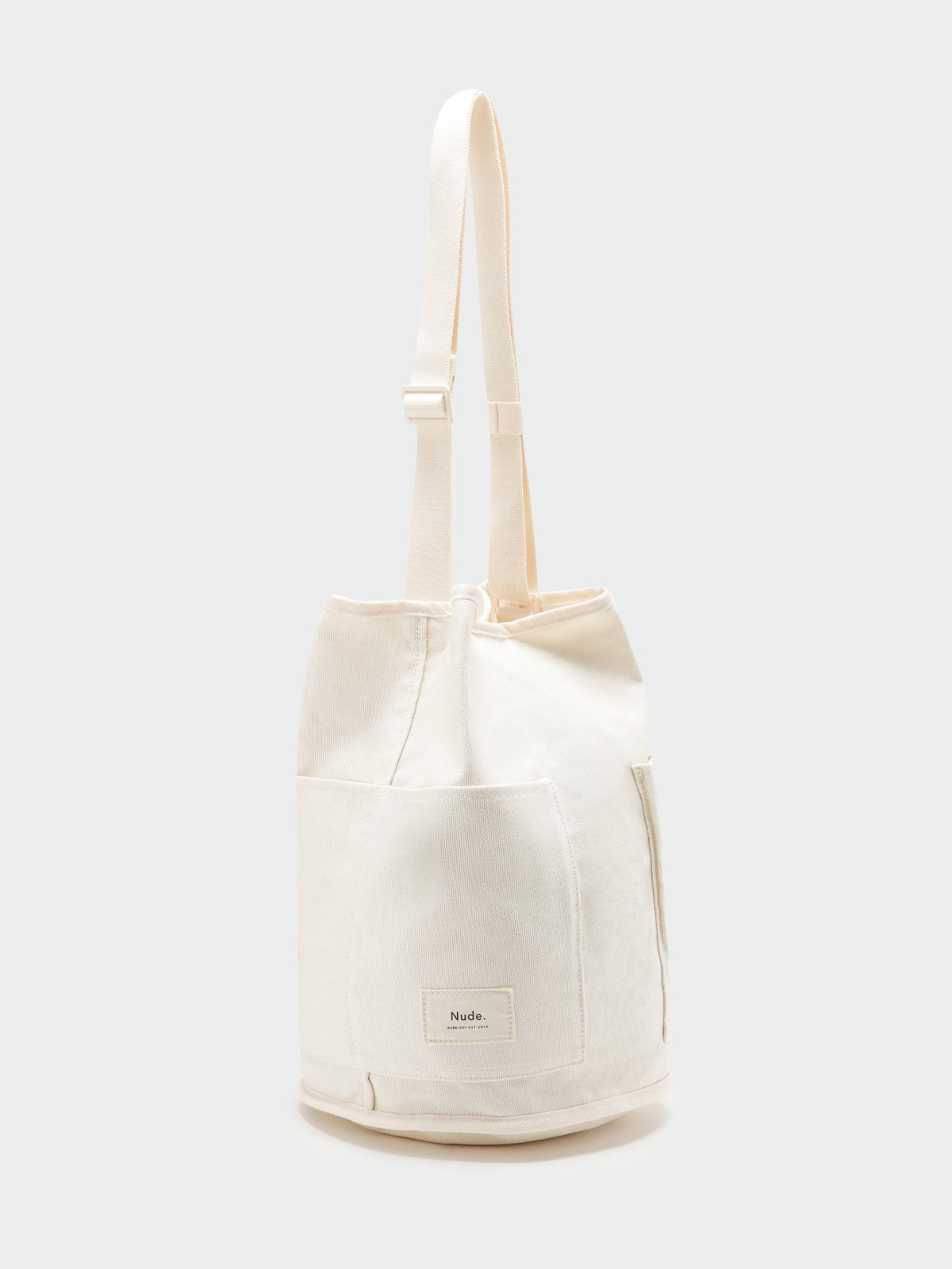 Nude Lucy Canvas Bucket Bag in White | Cloud