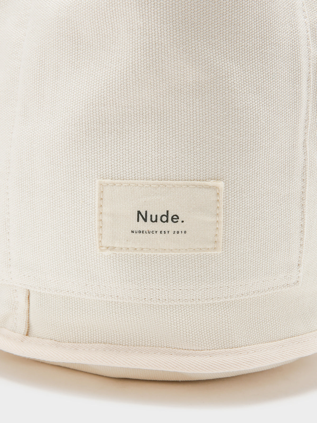 Nude Lucy Canvas Bucket Bag in White | Cloud