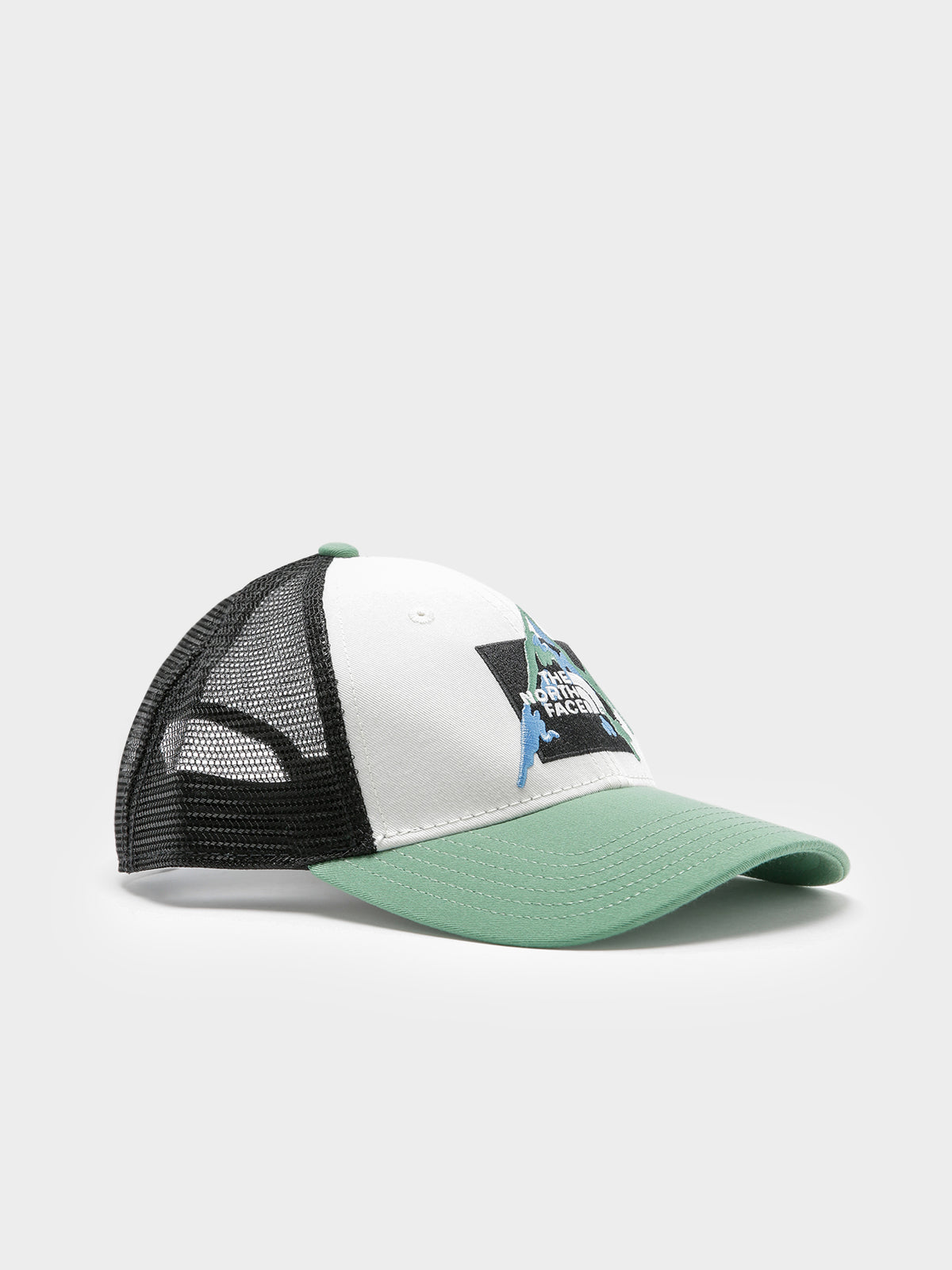 The North Face Mudder Trucker Cap in White & Green | White/Green