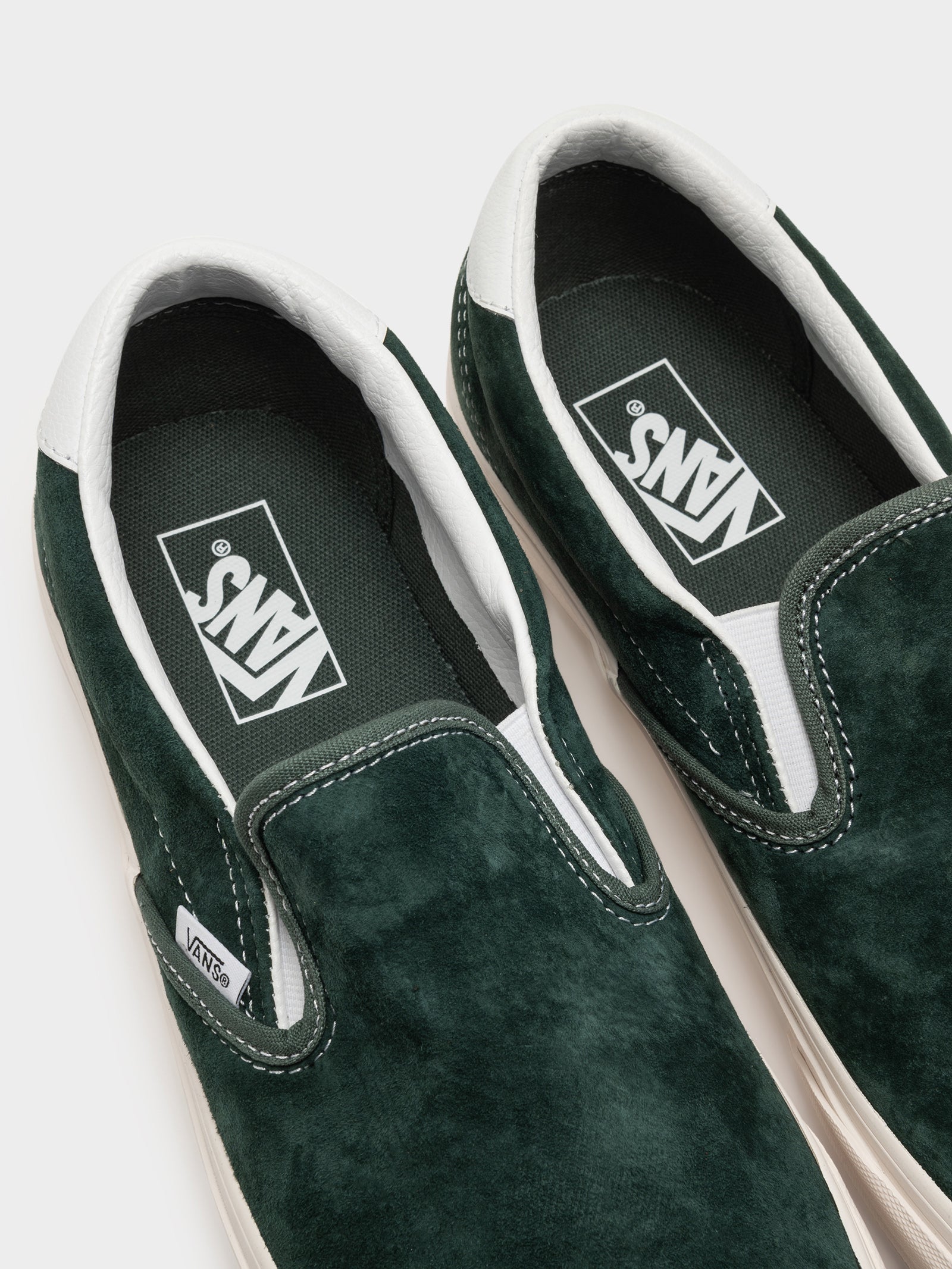 Forest green on sale slip on vans